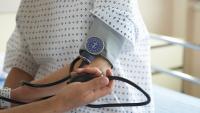 Close up of patient getting blood pressure measured.